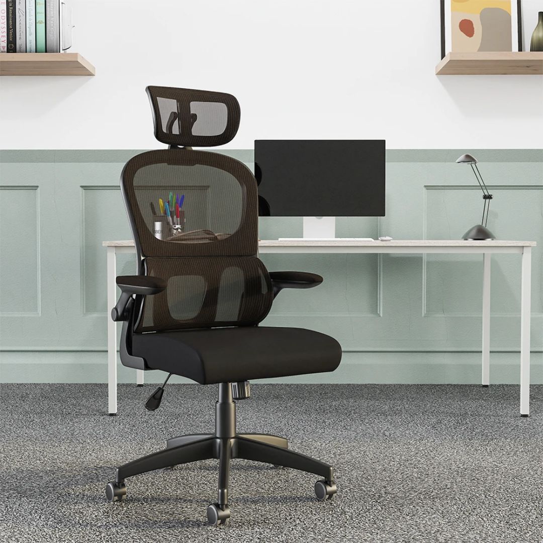 Healthy Home & Office - Black office chair in front of a white desk with a computer monitor in an office setting.
