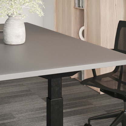 Healthy Home & Office - Flyga height adjustable desk corner in a home office with an office chair
