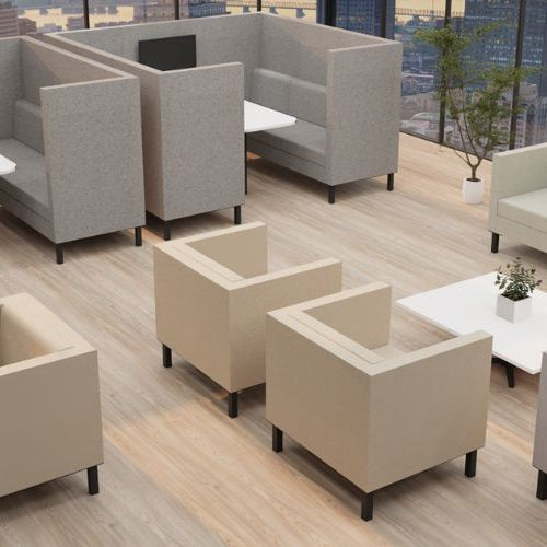 Modern office lounge with beige chairs and tables in a cityscape view.